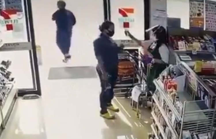 Convenience Store Employee Sprays Disinfectant to Lady Customer’s Eyes