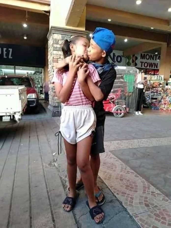 Controversial Photos Of Teenage Couple Kissing In Pu