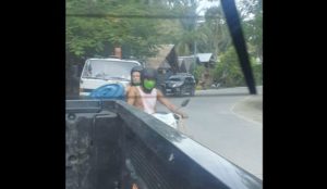 Andi Eigenmann backriding with water container