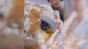 Jollibee cheesy bacon burger with plastic cap