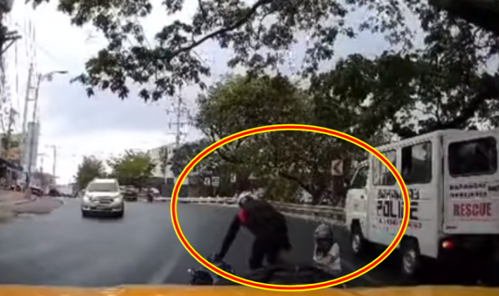 Motorcycle Rider Hits Illegally Parked Barangay Police Vehicle (Video)