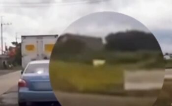 passenger throws garbage