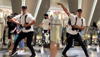 TikToker dancing on escalator