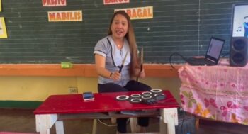 teacher playing drums