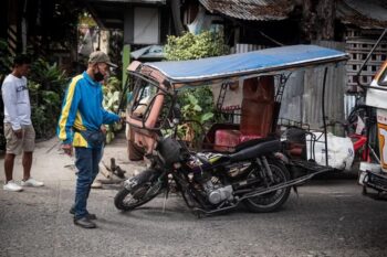 Elderly Pedicab Driver