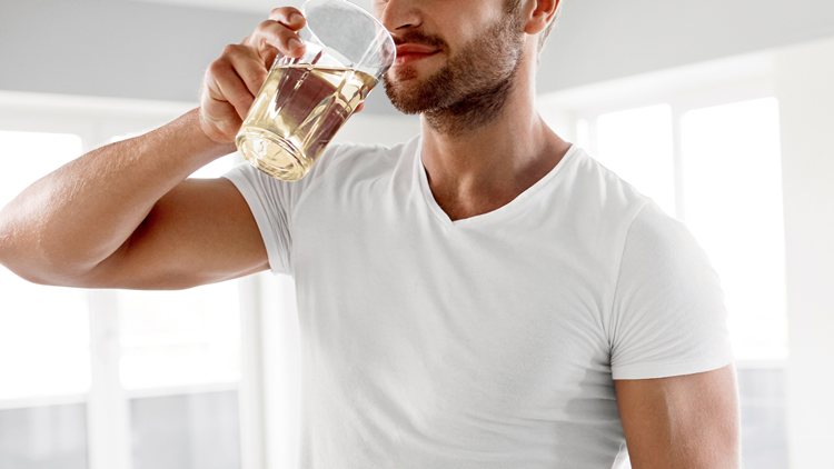 man drinking Apple Cider Vinegar