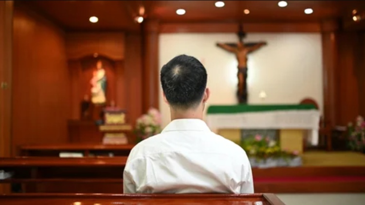 man praying
