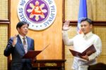 Education Secretary Sonny Angara taking his oath before President Ferdinand Marcos Jr. in Malacanang
