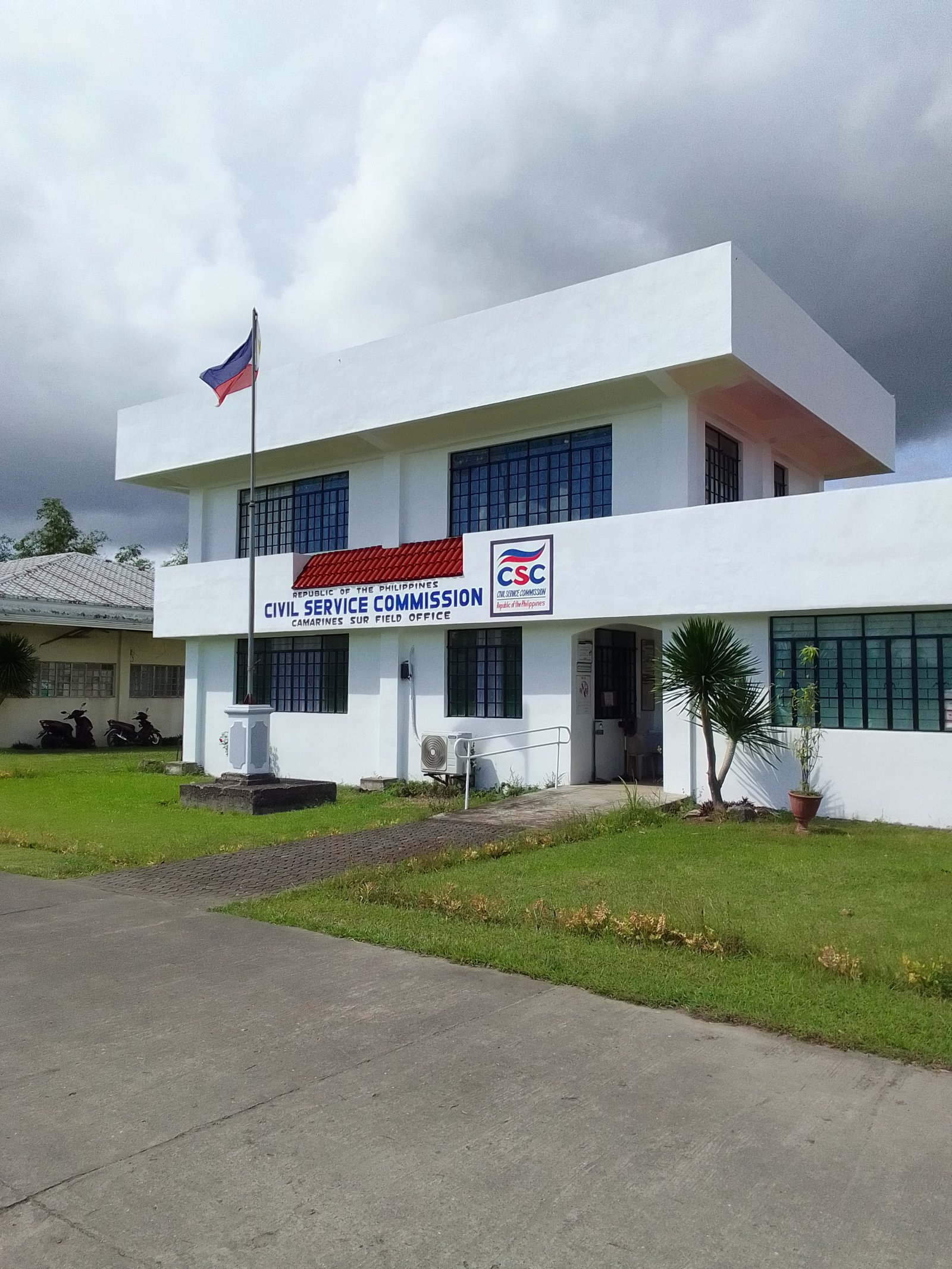 Civil Service Commission regional office building with Philippine flag