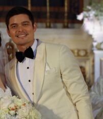 Actor Dingdong Dantes smiling in a white tuxedo jacket and black bow tie