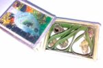 Matchbox with palm-leaf compartments used to keep fighting spiders in the Philippines