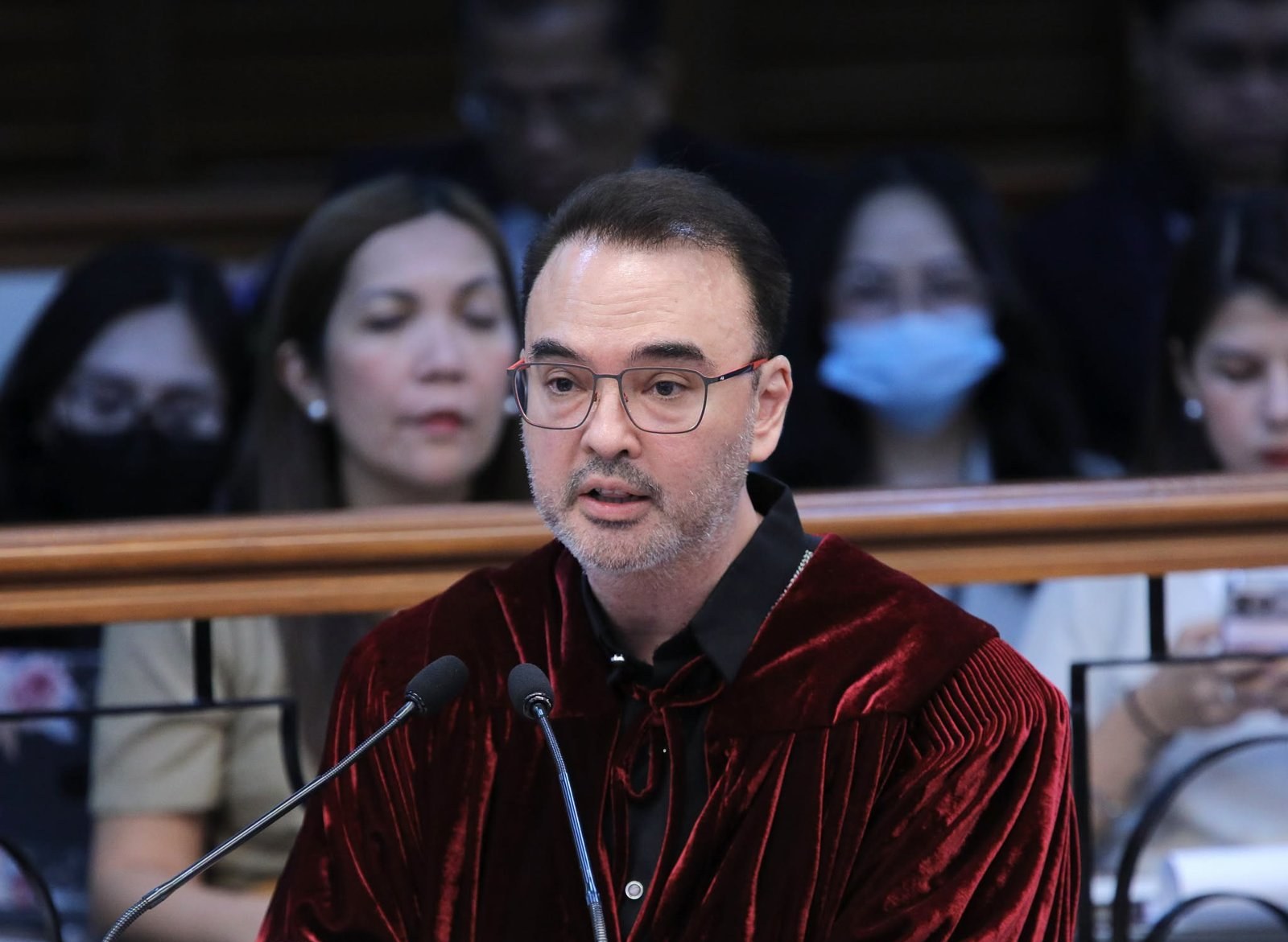 Senator Alan Peter Cayetano in senator-judge robe speaking at the Senate impeachment court