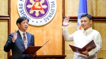 DepEd Secretary Sonny Angara taking his oath before President Marcos