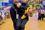 Gymnast Carlos Yulo smiling at a SEA Games venue